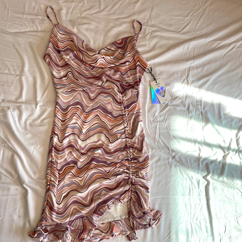 New with tags, sexy, draw string, mini dress. Super cute🐥